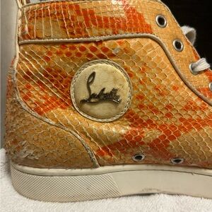Louboutin men’s Orange Snake Print python  High-Top Sneakers